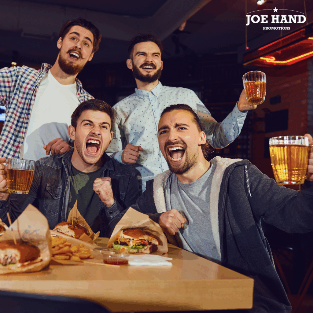 Sports fans cheering in a bar