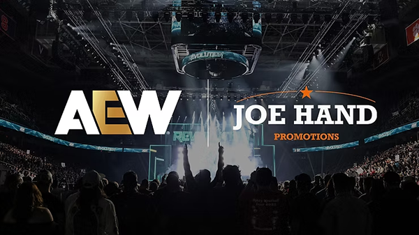 Fans cheering at an AEW event with an AEW and Joe Hand Promotions logo